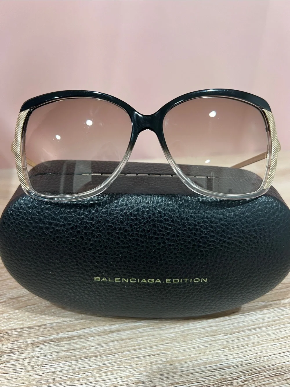 Balenciaga Black-to-Clear Frame Sunglasses with Brown Gradient Lenses